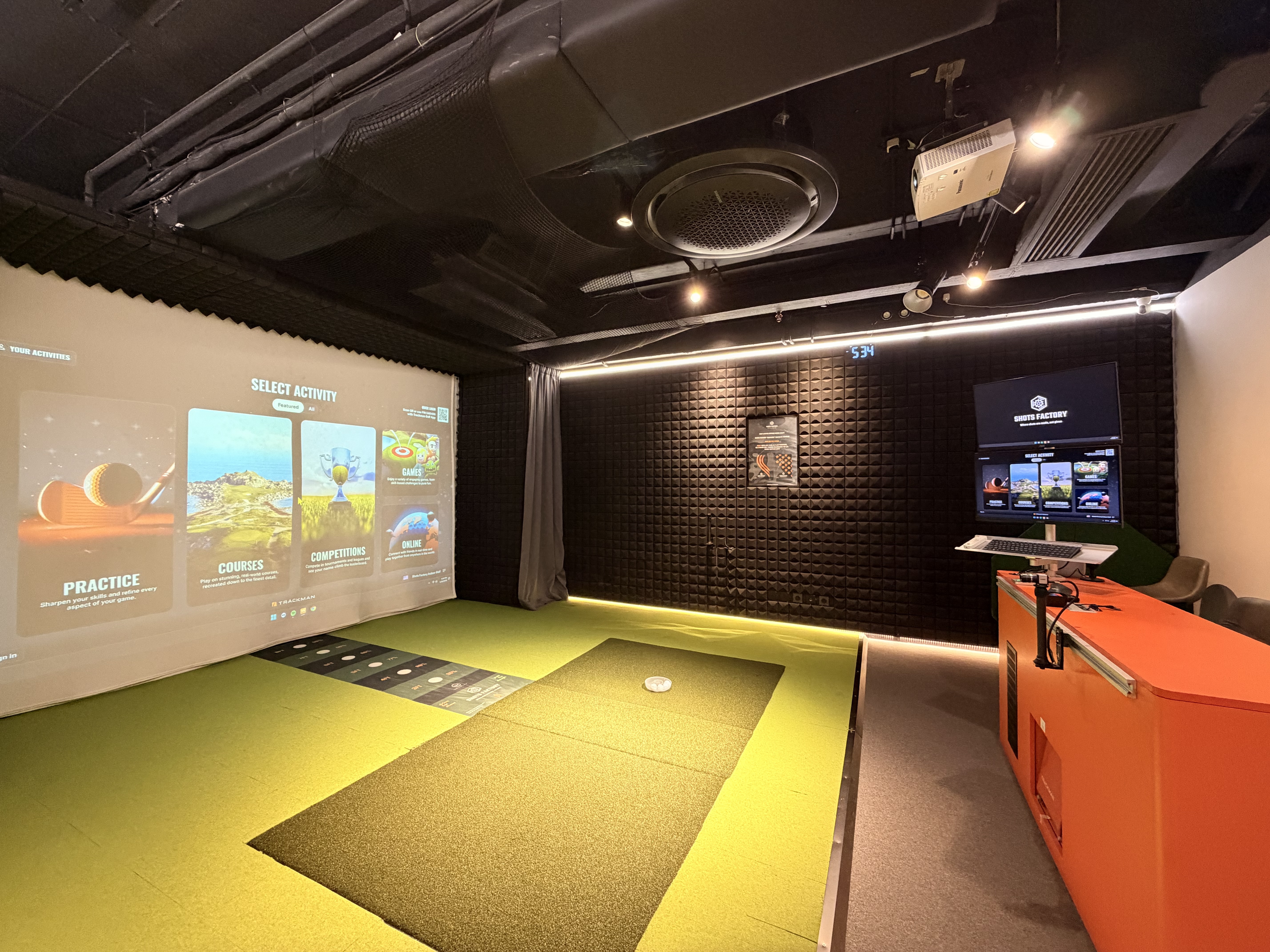 Shots Factory HKU indoor golf simulator studio with TrackMan technology in Hong Kong